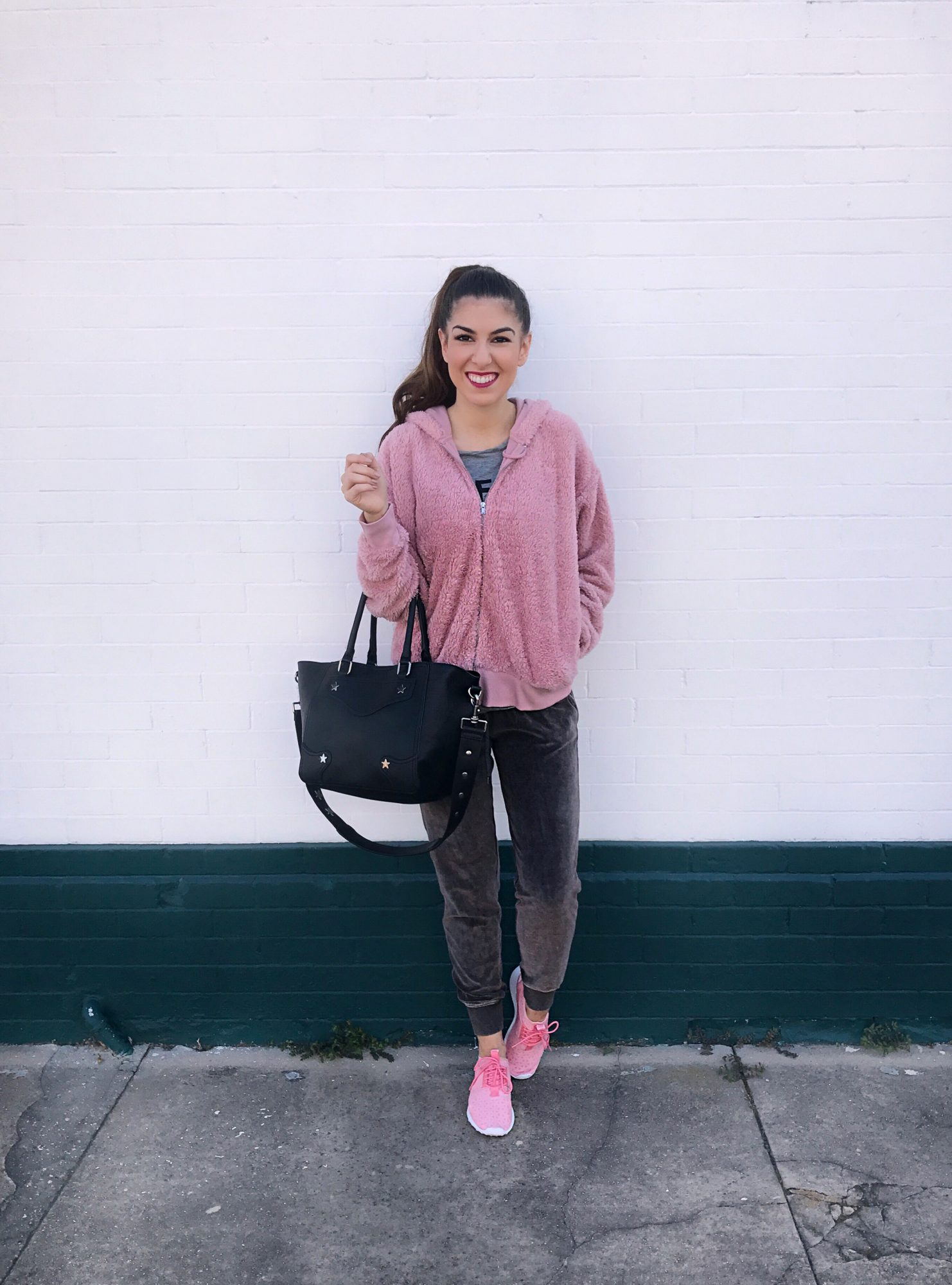 pink joggers and hoodie